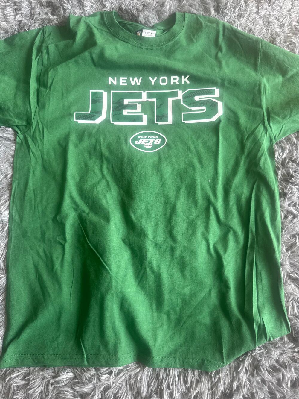 Green New York Jets short sleeve graphic t-shirt